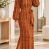 Copper bobble column crochet dress with long bishop sleeves, ribbed cuffs, matching belt, and scalloped hem worn with nude heels